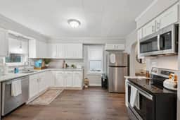 Charming 2br home on Swan Creek! Private office. - Image 2